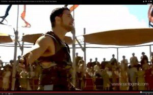 A man wielding a sword captivates a crowd, provoking thought and inspiring change through his captivating YouTube videos.
