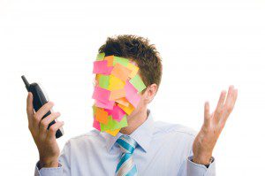 A man with sticky notes on his face showcasing The Myth of Multitasking.