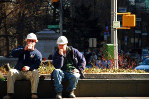 Two introverts bonding over a shared silence on a ledge.