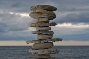 A serene stack of rocks at the tranquil oceanfront.