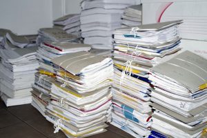 A cluttered room filled with papers.
