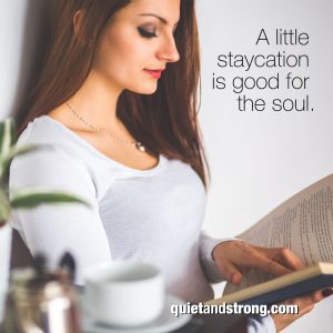 An introverted woman finding solace in a staycation, reading a book and embracing the quote "a little staycation is good for the soul.