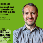 A man with short hair and a trimmed beard stands with arms crossed in front of a green background with podcast details about introvert growth and guest Caspar Mahoney.