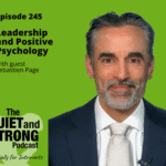 A man in a suit and tie is shown next to text promoting episode 245 of The Quiet and Strong Podcast about leadership and positive psychology with guest Sebastien Page.